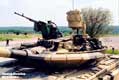 Танк Т-72М1М с КАЗ «Арена». На танке также установлен комплекс усовершенствованной динамической защиты. 