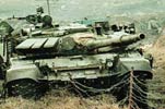 Т-72БМ оснащенный противокумулятивной защитой в Чечне