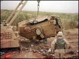 Танк М1А2, подорванный на фугасе, башня сорвана.