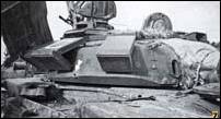 Т-72Б (М) 74 гв. омсбр, пораженный выстрелом из РПГ в незащищенный промежуток между КДЗ погона башни и надгусеничным топливным баком