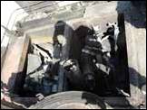 Танк из состава частей НГ США сожженный в результате нарушения техники безопасности транспортировки. На фото 2 виден взорвавшийся боекомплект размешенный в забашенной нише.